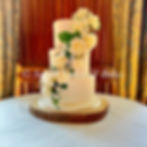 Draped white roses & gypsophila