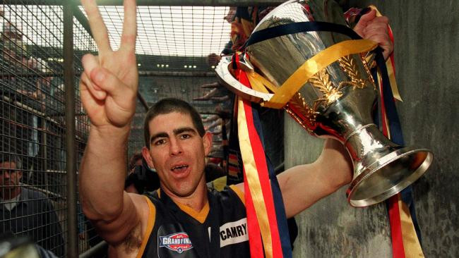 Darren Jarman celebrates winning the AFL Premiership