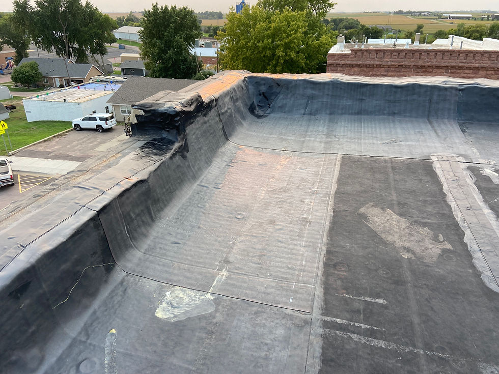 Rock Parapet Wall Rubber Roof Repair