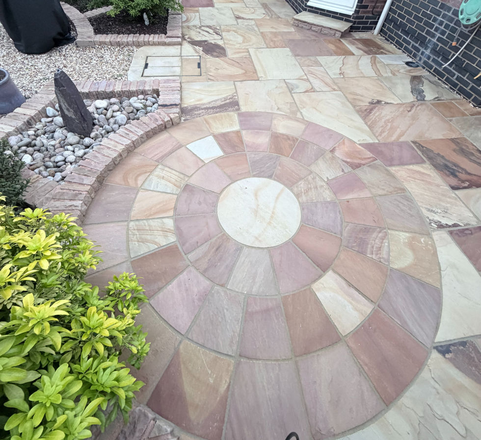 Indian sandstone patio in Worcester that has been professionally cleaned and repointed by XTX Limited.