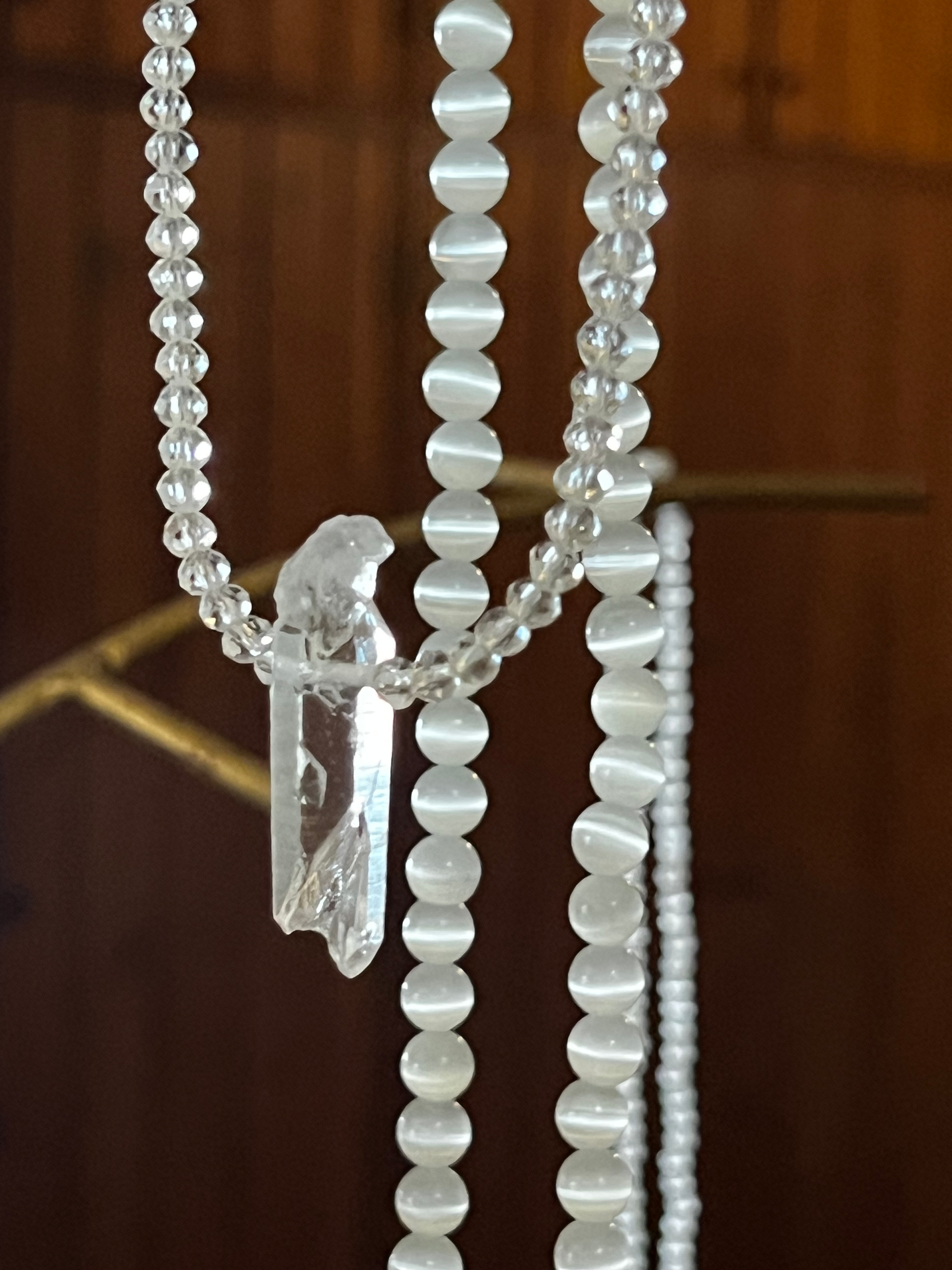Clear Quartz Pendant on a clear beaded necklace