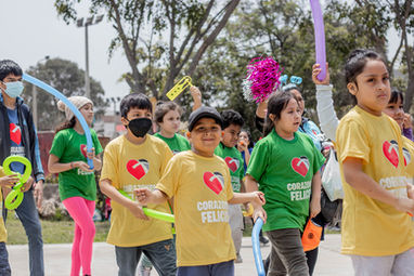 group of kids playing with ballons