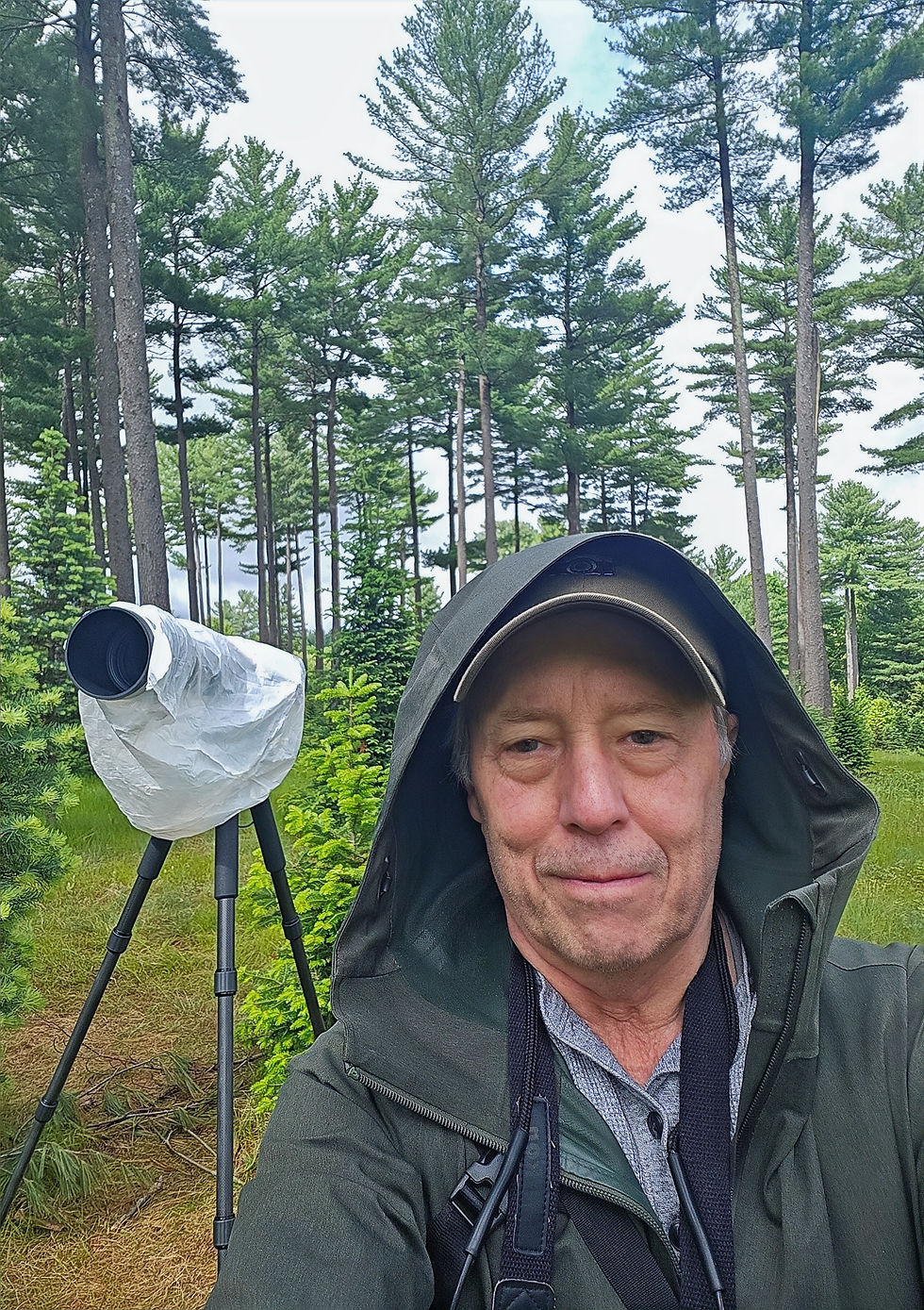 My typical rain gear and my expensive spare of the moment camera rain jacket.