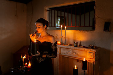 mysterious and luxurious table set up, cigars, candles and atmospheric events by Evita Vagia