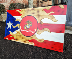 Custom, burnt wooden Puerto Rican flag, with US Marine corps center insert flag. This is a piece bought as a gift for a retiring USMC officer.
