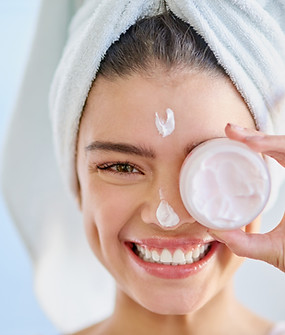 Woman with Face Cream