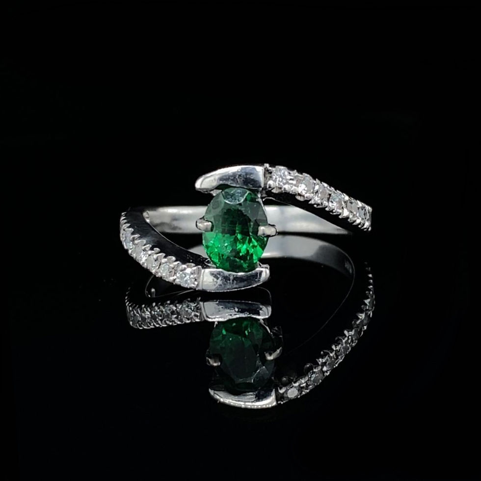 Oval Cut Tsavorite and Diamond Bypass Engagement Ring in White Gold