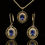 Thumbnail: Oval Cut Tanzanite Intricate Filigree Pendant and Drop Earrings Set in Yellow Gold