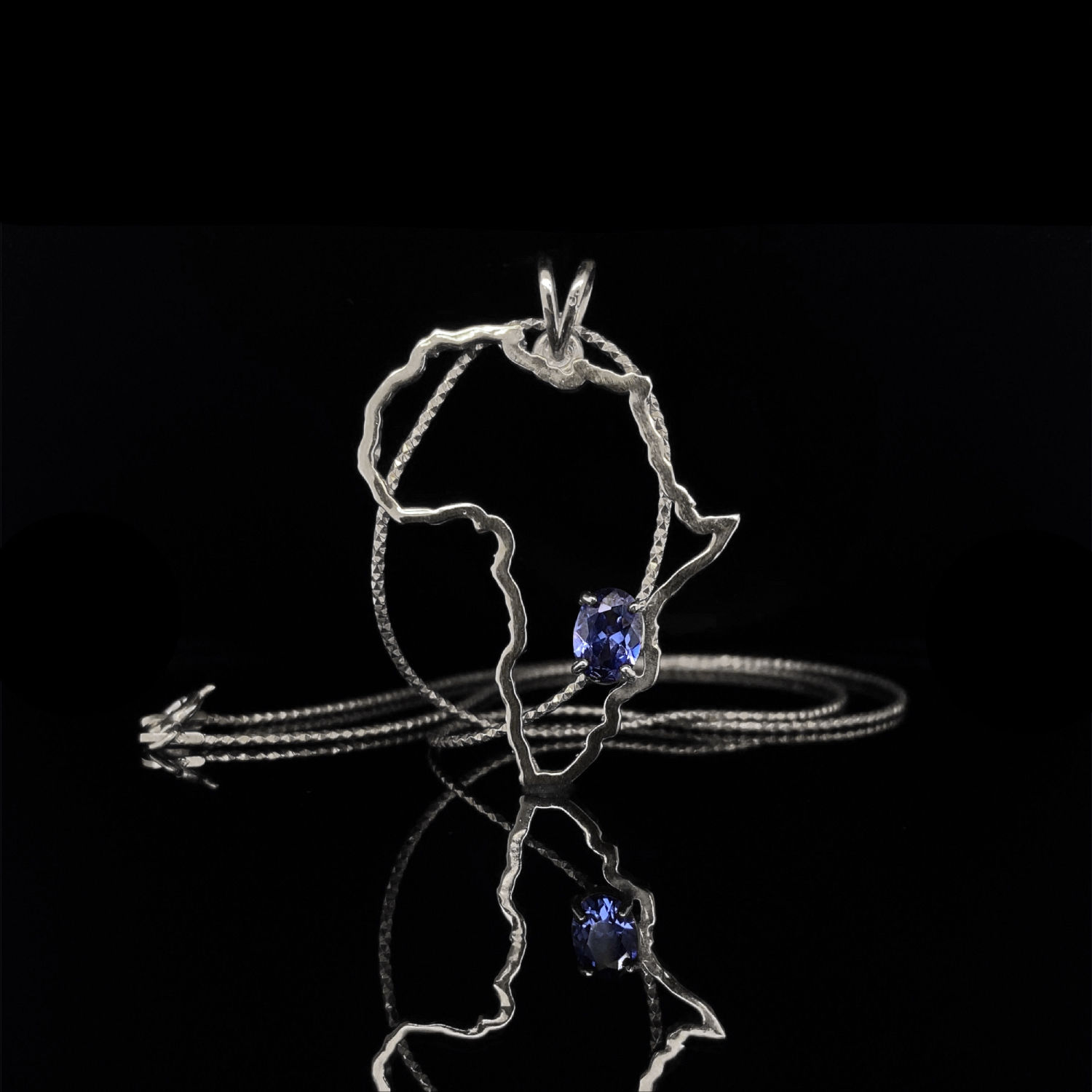 Oval Cut Tanzanite Africa Map Pendant in White Gold