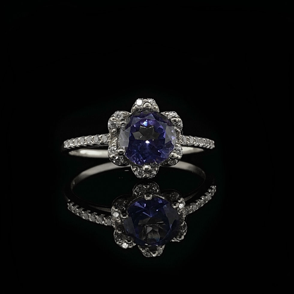 Round Cut Tanzanite and Cubic Zirconia Floral Halo Engagement Ring in White Gold