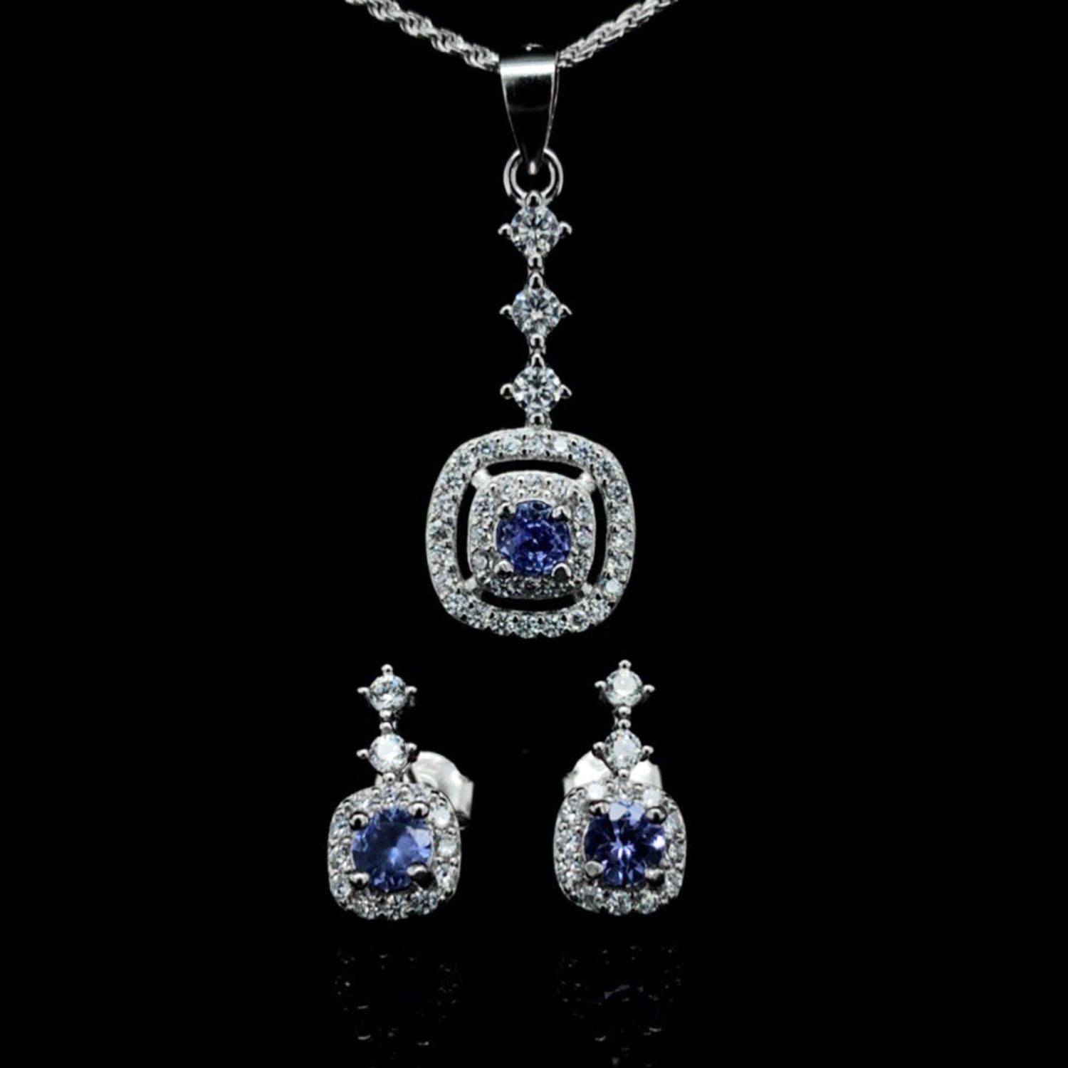Round Cut Tanzanite and Cubic Zirconia Double Halo Pendant and Stud Earrings Set in White Gold