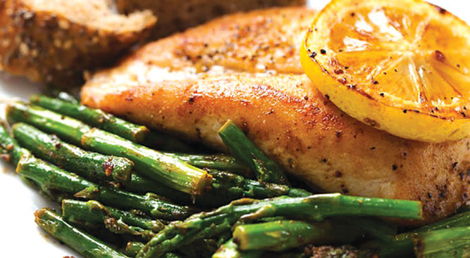 Roasted thighs in orange juice with asparagus with $5 budget.