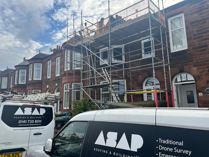 Slate roofing repairs on historic tenement property in Hillhead Glasgow