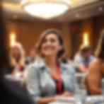 Young woman at a brightly lit conference.jpg