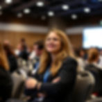 Young woman at a conference.jpg