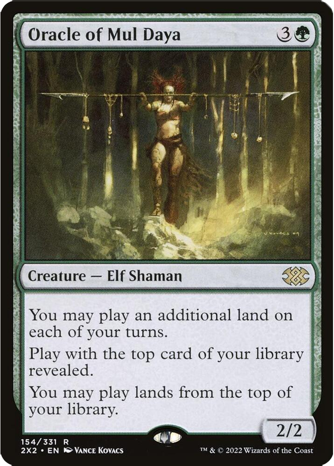 Oracle of Mul Daya card: Elf Shaman in forest holding staff with hanging objects; text describes card abilities; mystical, earthy tones.