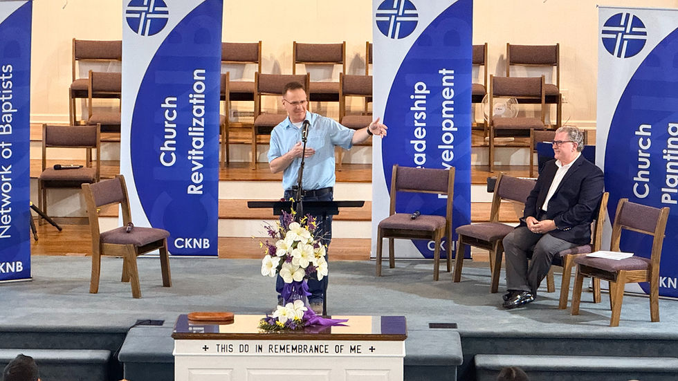 Newly approved Executive Director, David Barron, offers words of gratitude to those in attendance for approving his appointment. CKNB President, Steve Price, looks on.