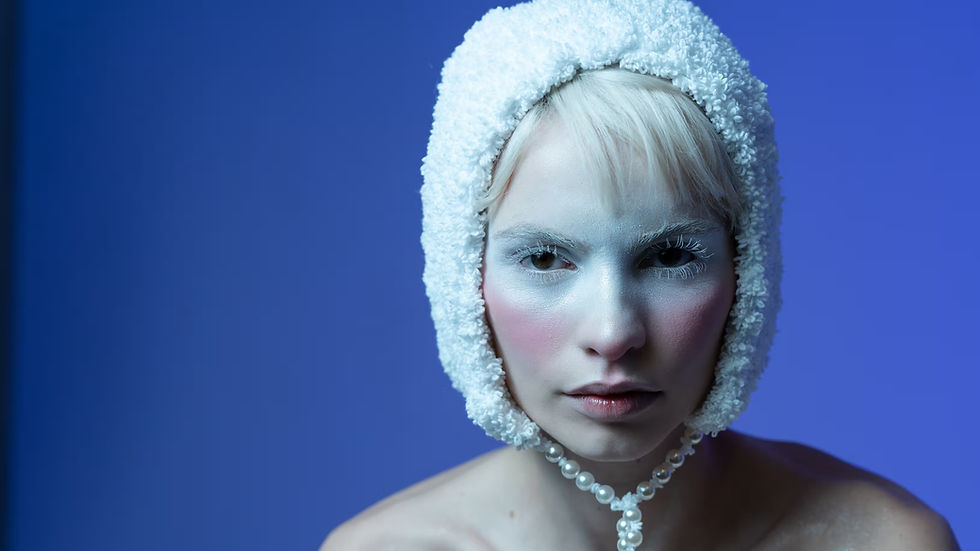 conceptual-beauty-portrait-blue-backdrop-studio_edited.jpg
