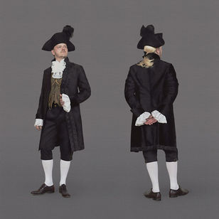 Two men wearing historical costumes in black