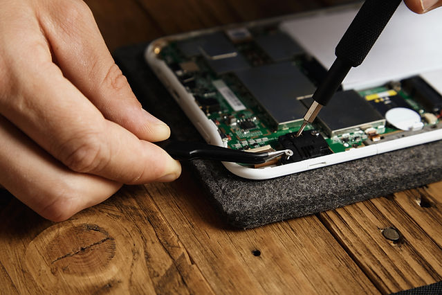 master-uses-special-tools-disassemble-electronic-device-carefully-pincers-bit-screw-driver