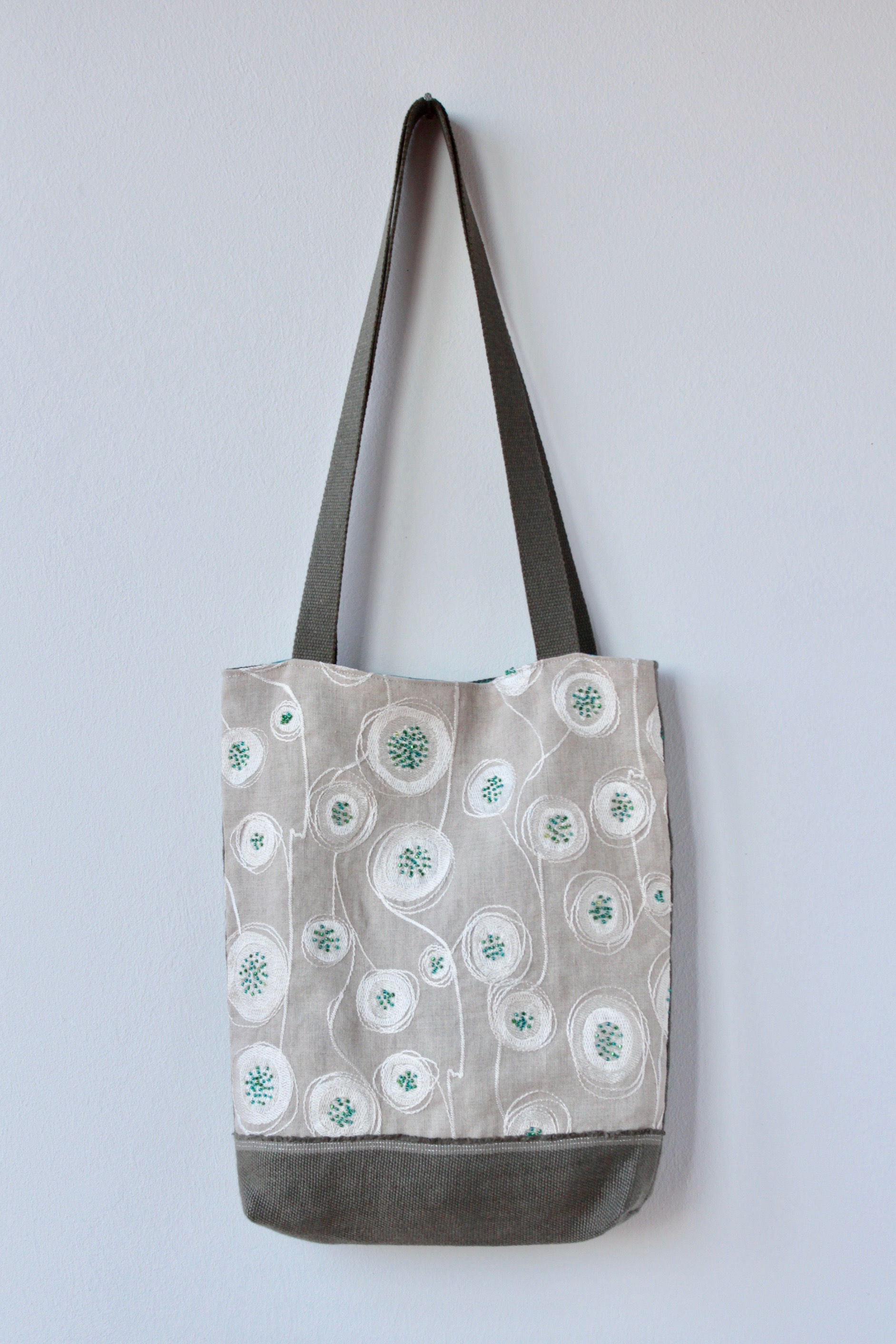 Green Sparkles floating in Sand