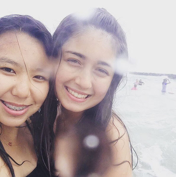 Emily at the beach with friends