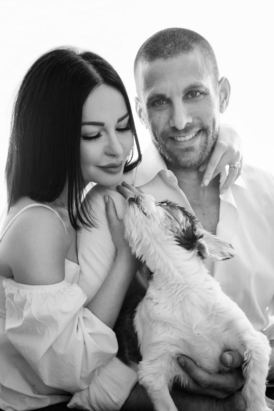 Black and white couple and their dog portrait in NYC studio, anniversary session