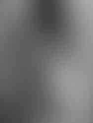 Studio maternity photography portrait using flowing maternity wraps during a Chic maternity experience in NYC.