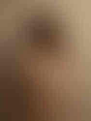 High-end maternity photoshoot in New York City featuring a poised expectant mother