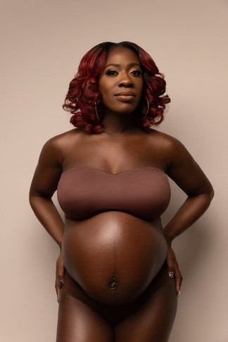 Luxury maternity portrait of a pregnant woman photographed in the Portrait Madame NYC studio during the Chic Maternity Experience.