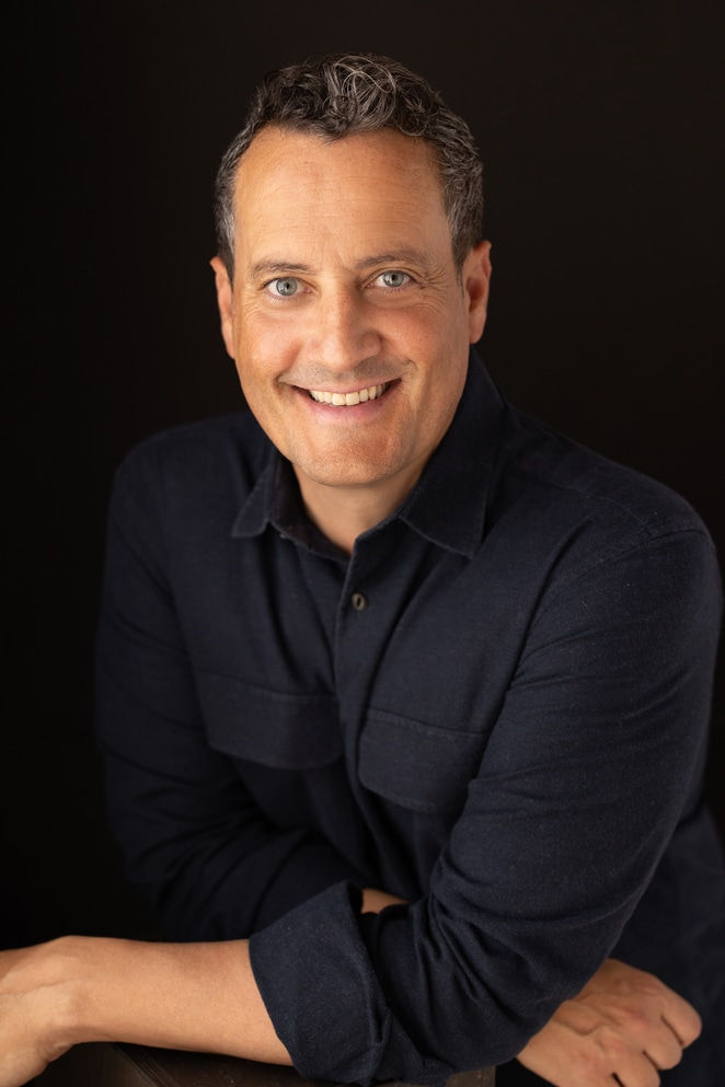 Linkedin Profile Photo of a man smiling taken at Manhattan portrait studio in New York