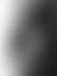 Couple maternity portrait of expecting parents embracing during a studio maternity photoshoot in New York City.