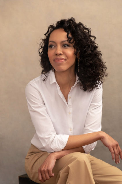 Luxury executive portrait of a female entrepreneur in color in NYC studio