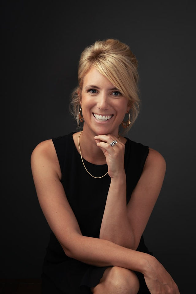 smiling Linkedin profile photo of a woman lawyer taken at the best headshot studio in New York City