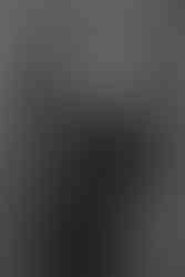 Expecting mother in black maternity dress during NYC photo session