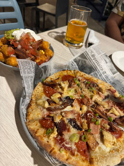 Pizza and loaded tots at Old Harbor