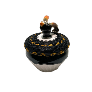 Pine needle pot with bird on top