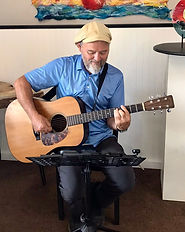 Peter playing guitar