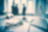 close-up-keyboard-glasses-with-executives-background.jpg