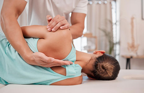 doctor-chiropractor-and-woman-with-back-pain