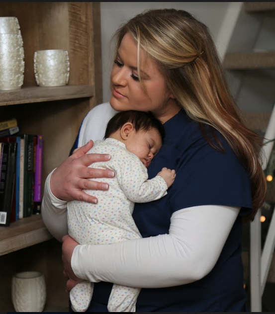 we now offer financing and a night nurse holding newborn