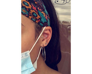 Conch Piercing by Mousey at Fine Ink Dr. Phillips