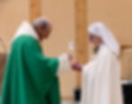 Maria Grazia reciving Communion