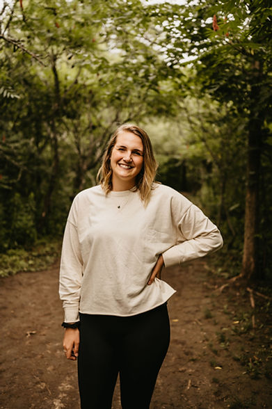 Female postpartum therapist in a forest in Guelph Ontario.