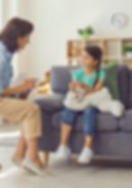 Young child engaging in a psychological evaluation session with a psychologist