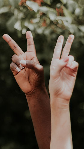 Two hands side by side