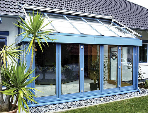 Timber ALuminium bifold doors installed in a ThermaDura conservatory