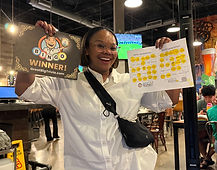 Happy music bingo winner at Funky Buddha Brewery in Oakland Park, FL