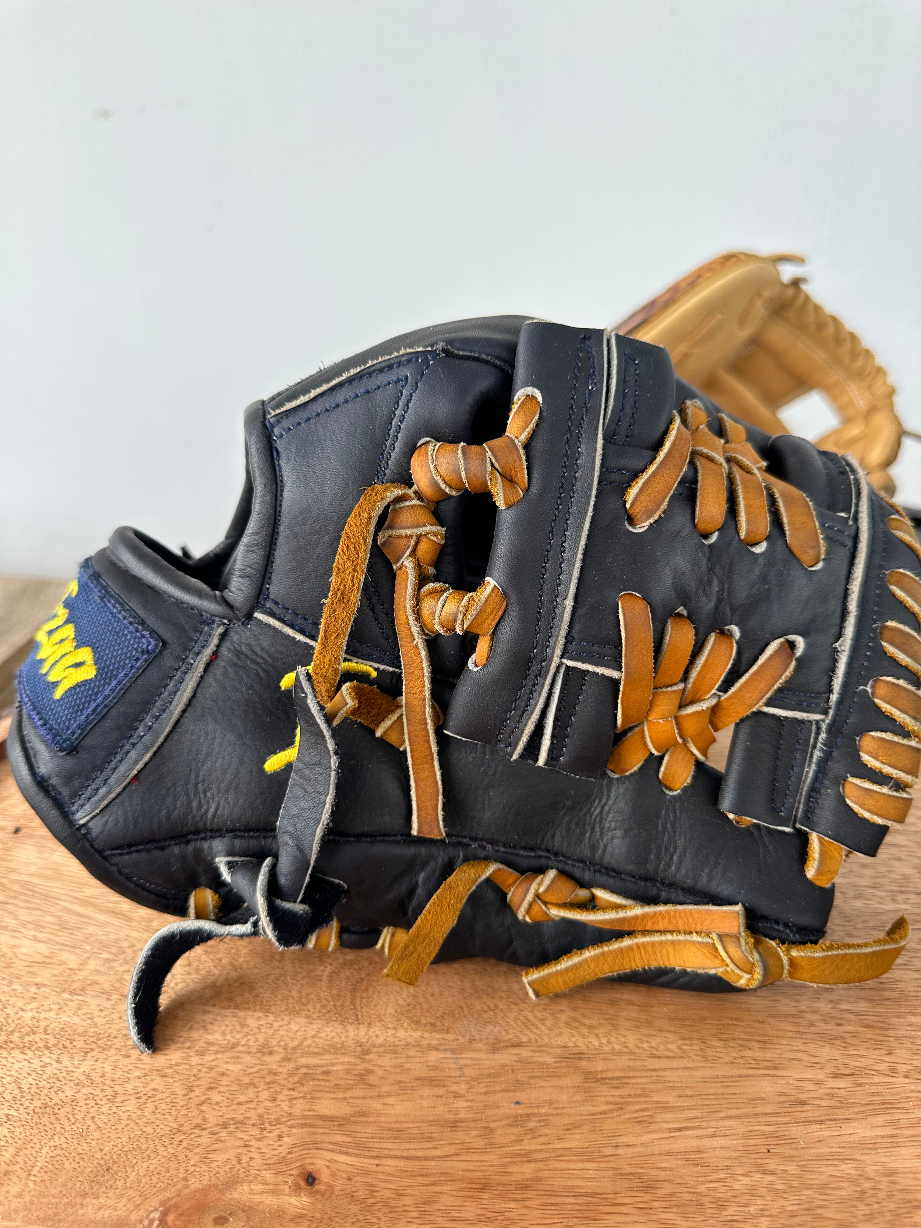 On sale 11.25” RHT Navy blue oiled and broken in 