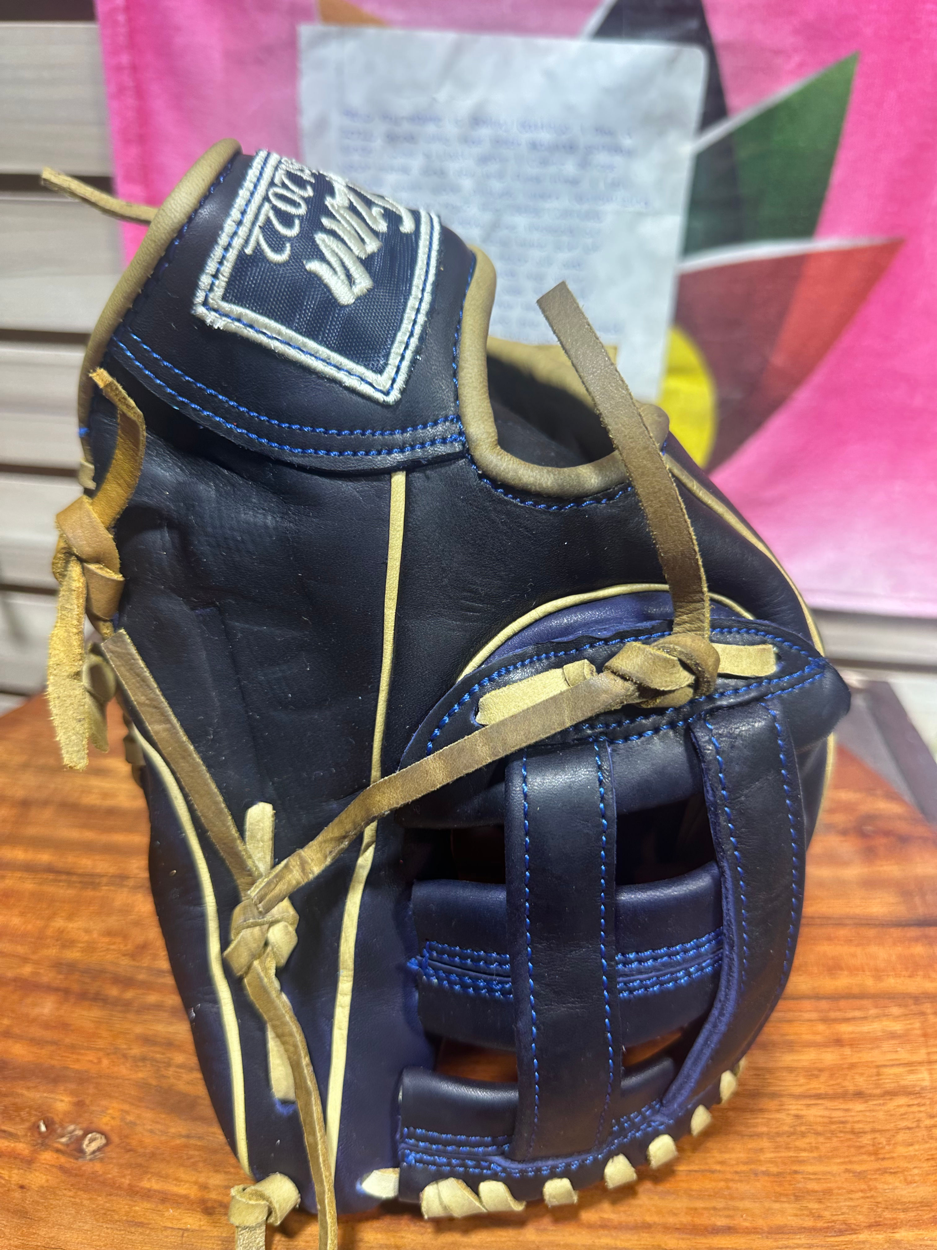 11.75”RHT, H-Web navy blue oiled and broken in , extra padding 